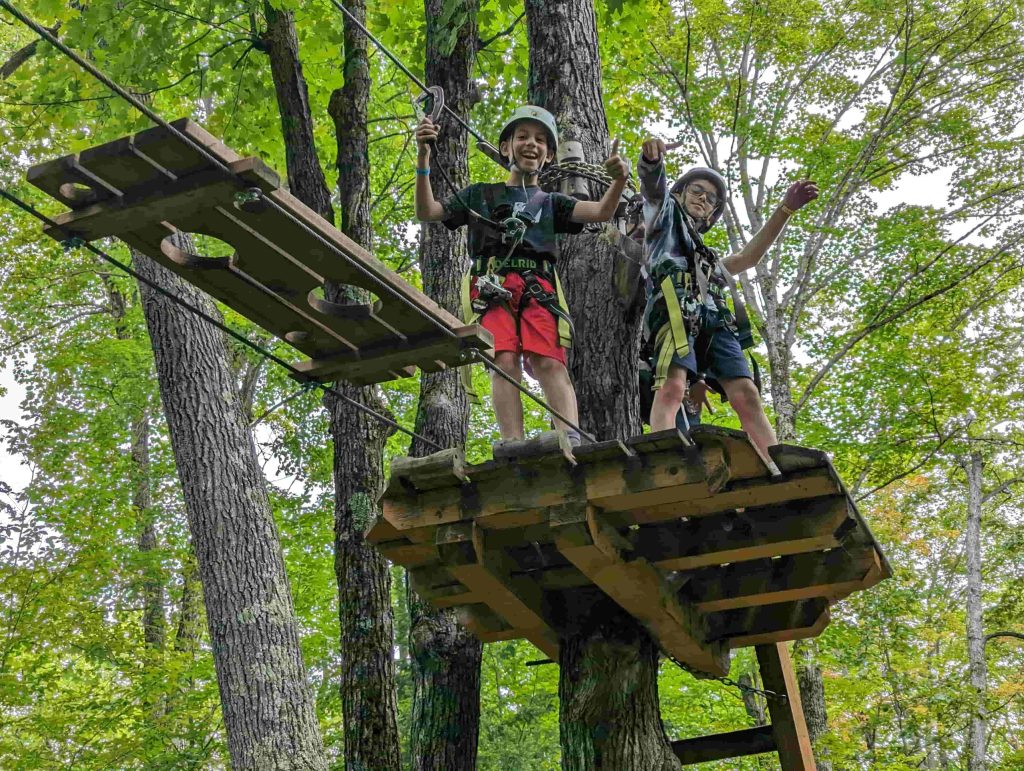 two boys ready to zipline - camp chai 2023