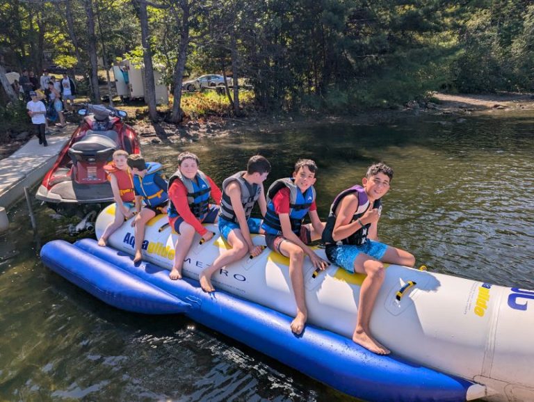 camp chai boy on a banana boat
